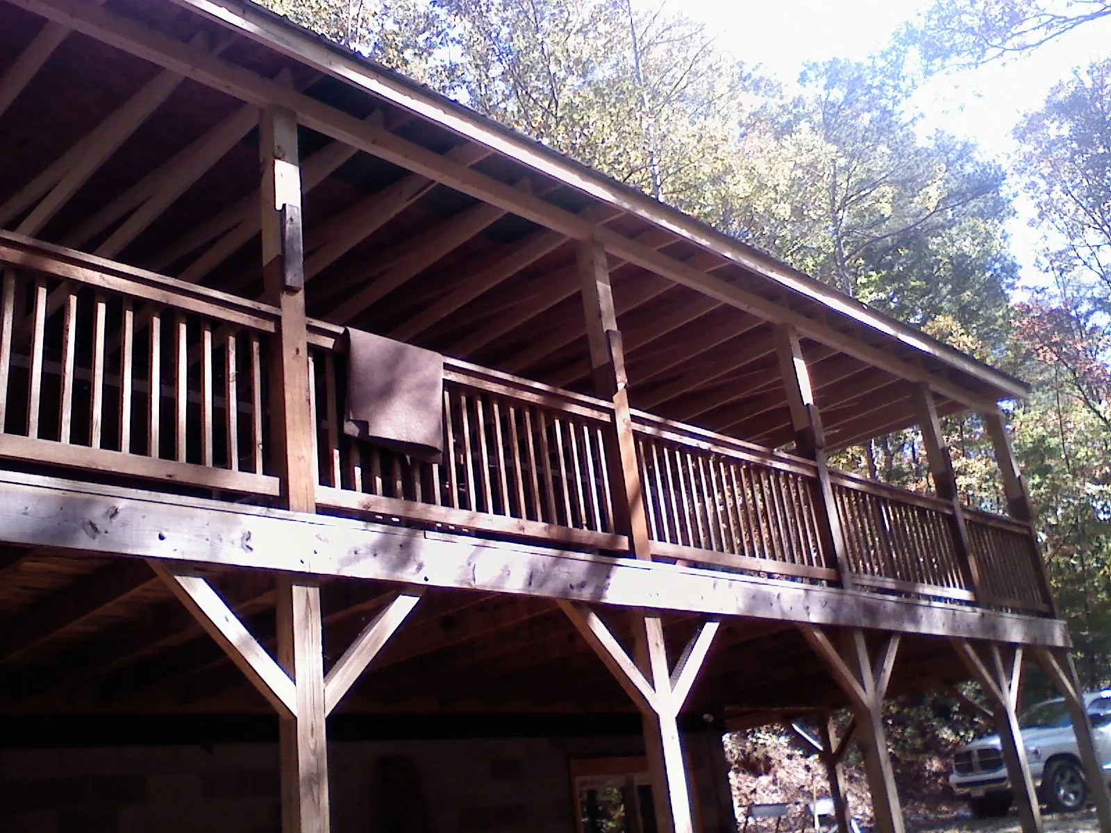 Timber framing under a new elevated porch and deck — Roof Leak Repair in Aldrich by Roofing Brothers